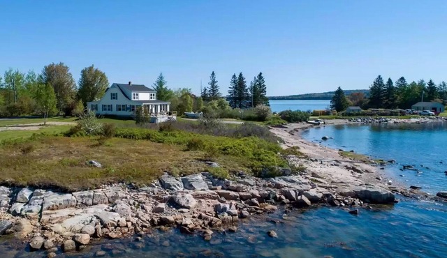 Have an unforgettable getaway at a family sized beach house with private beach!