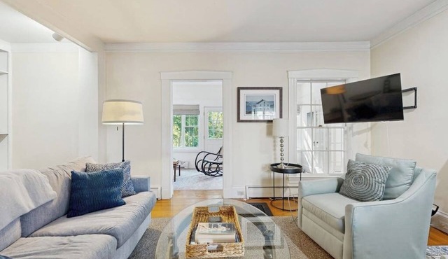 Historic home steps from the harbor with enclosed porches & gorgeous deck