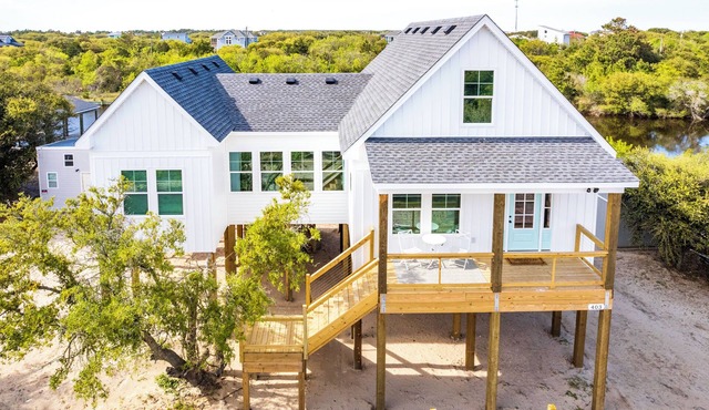 New CANAL front home a few rows back from the OCEAN! Beach passes provided!