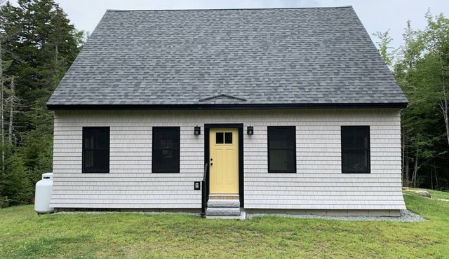 Newly built and fresh vacation home tucked in the woods of Mount Desert.