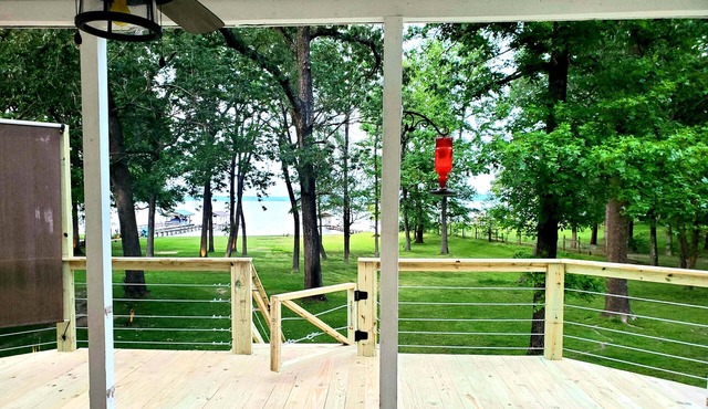 Relaxing Lakefront Home w/Boat Dock, Fire-pit and private Walk-in Beach! Gated