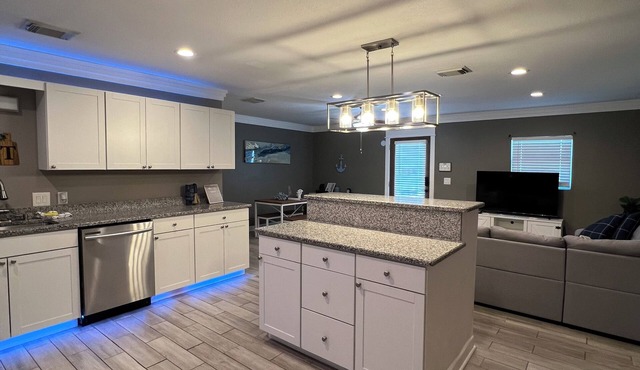 "Spacious 5-Bedroom Home with Versatile Living Areas and Private Pool