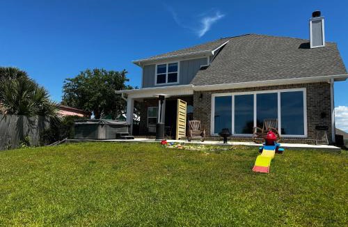 Navarre House | Waterfront Master Suite with Views of Barrier Island