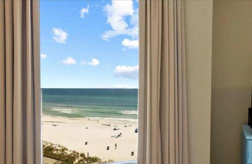 Modern 3BR Beachfront Condo with Wraparound Views