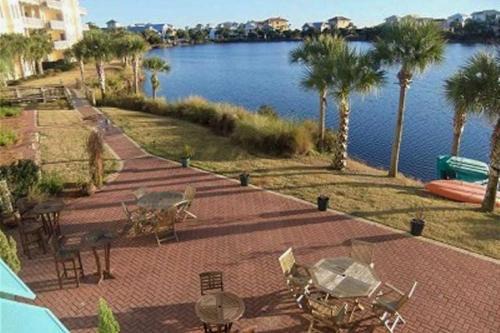Stylish condo with lake views bike rentals & pools - walk to the beach
